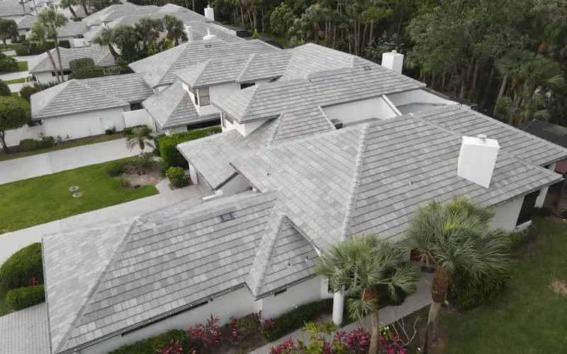 Finished flat-tile roof across a large Palm Beach County estate