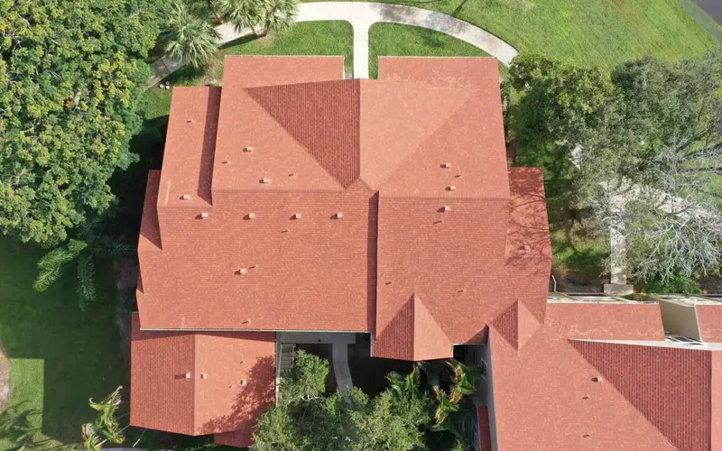 Completed architectural shingle roof on a large Florida home, seen from above